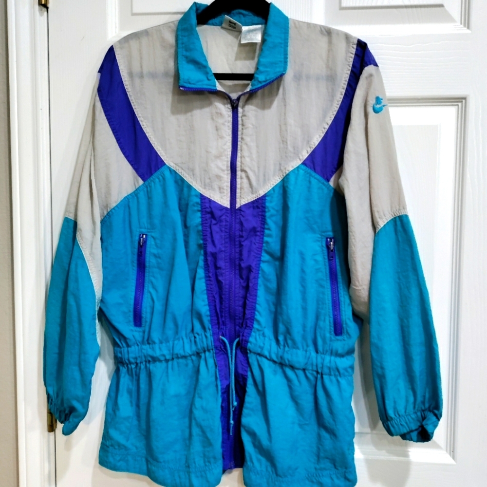 Vintage Nike women's blue grey cinched waist windbreaker jacket size Med…